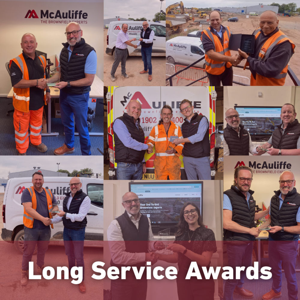 Long service McAuliffe staff members receiving their awards.